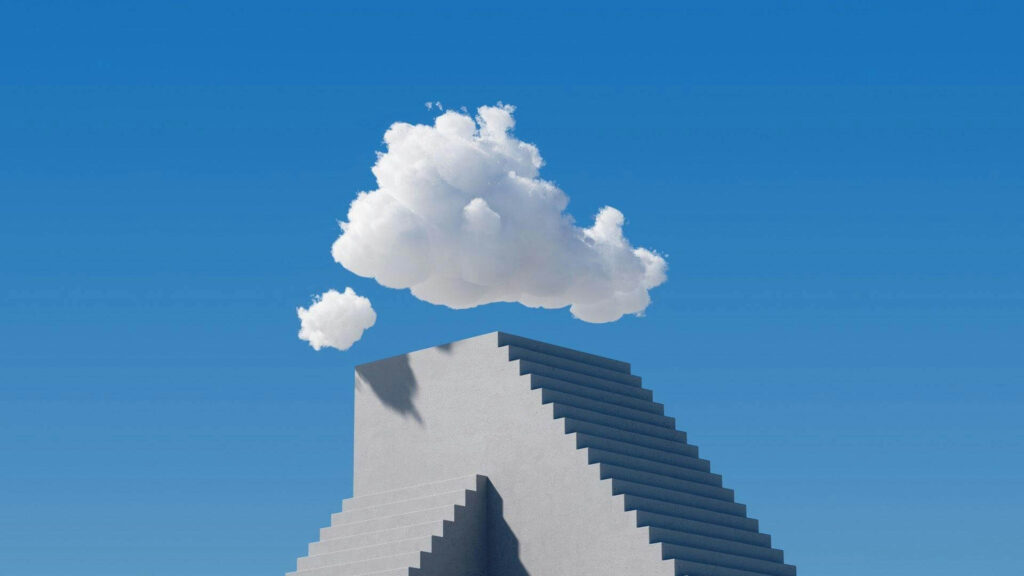 three dimensional gray stairs below a blue sky with white fluffy cloud