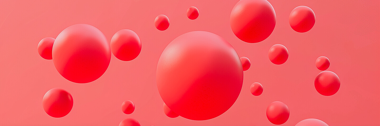 red 3d spheres on a lighter red background